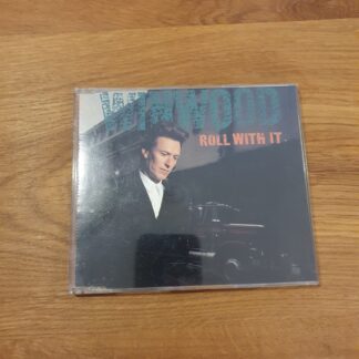 Steve Winwood - Roll With It