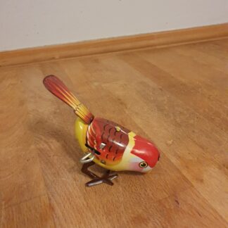 Optrækkelig vintage fugl i blik