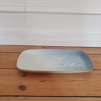 Mågebakke med guldkant
