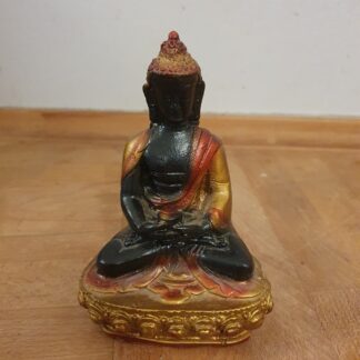 Buddha figur i plastik