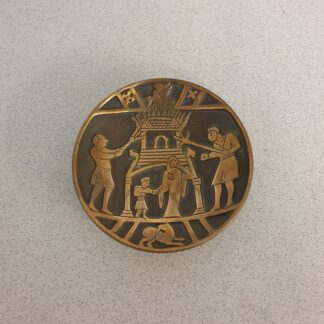 Kobbertallerken med mønster