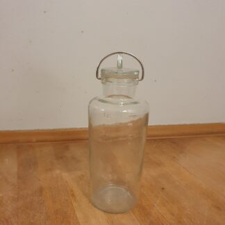 Deciliter måler i glas med låg