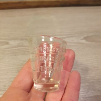Lille målebæger med glas