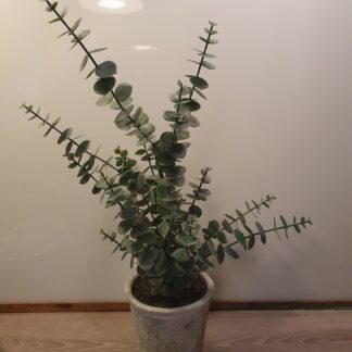 Kunstig blomst i urtepotte