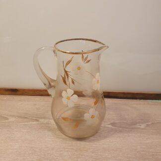 Kande i glas med blomster motiv