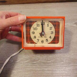 Orange ur med mønster