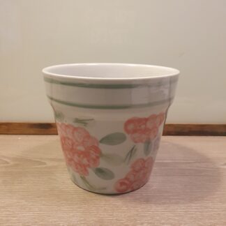 Urtepotte med blomster på