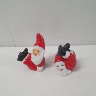 2 små nisser i porcelæn