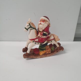 Julemand på gyngehest i porcelæn