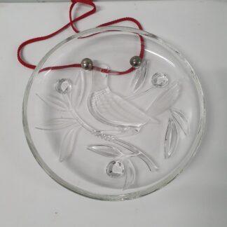 Platte i glas med billede af fugl