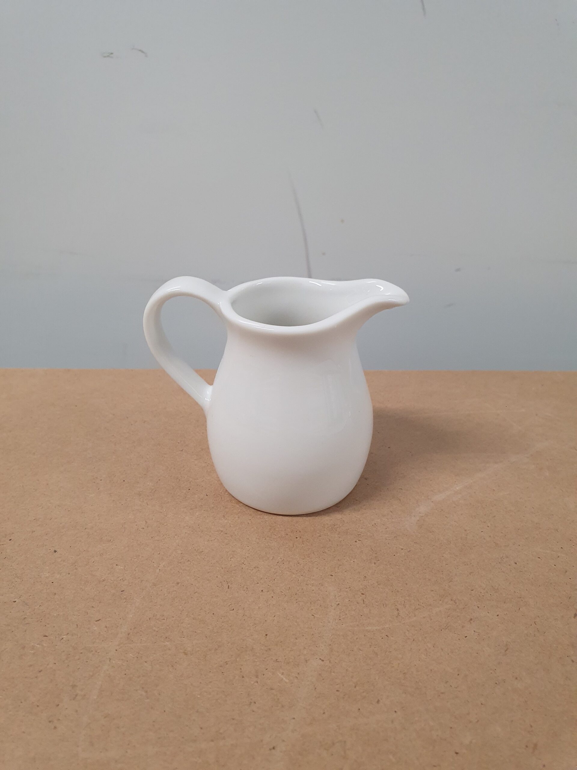 Flødekande i porcelæn