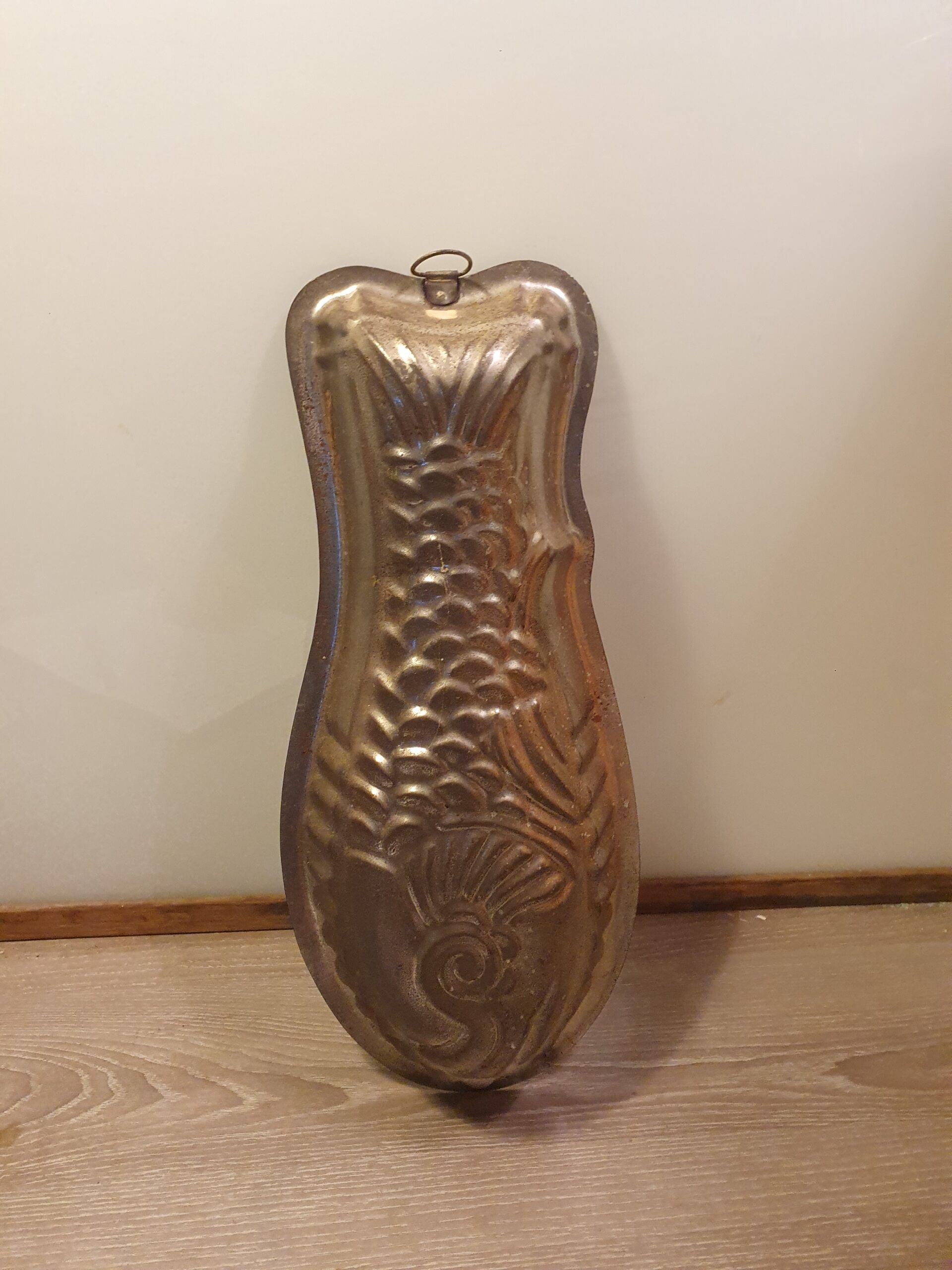 Fiskeform i metal